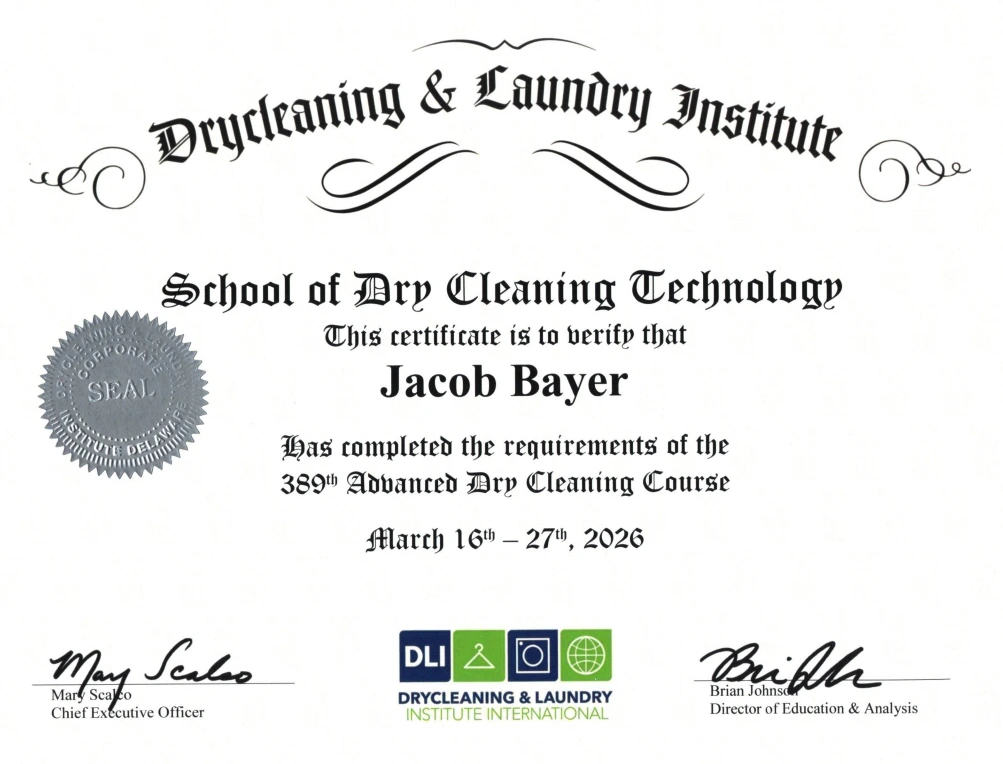 Certificate from Drycleaning & Laundry Institute awarded to Jacob Bayer for completing the 389th Advanced Dry Cleaning Course, dated March 16&ndash;27, 2026.